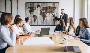 7group-people-working-out-business-plan-office